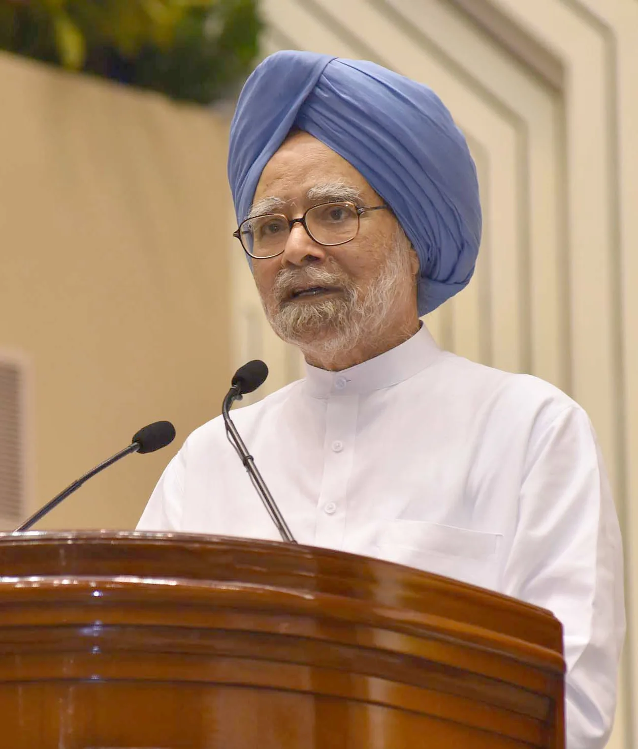 The former Prime Minister of India, Dr. Manmohan Singh addressing at the release of Book “MOVING ON… MOVING FORWARD A YEAR IN OFFICE”, published on the completion of One Year in the Office of the Vice