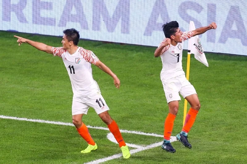Sunil Chhetri and Anirudh Thapa celebrating a goal in their group match against Thailand at 2019 AFC Asian Cup