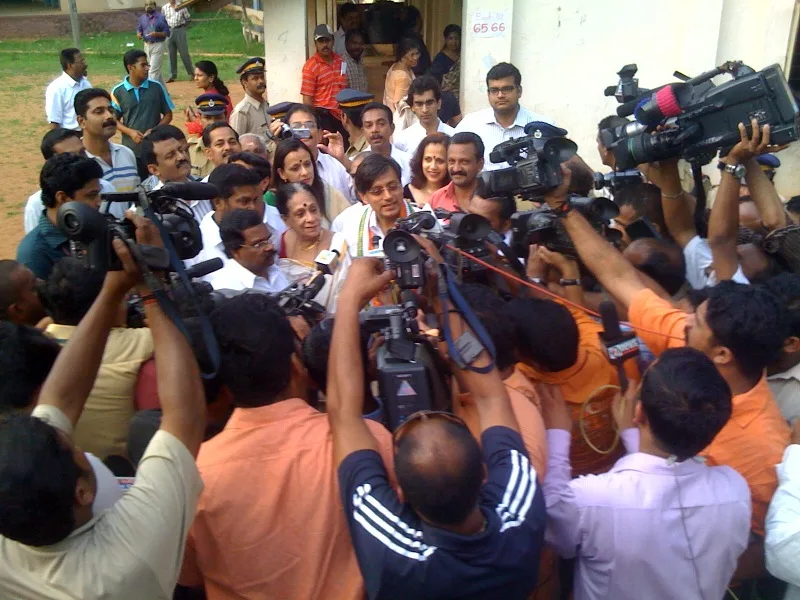 Shashi Tharoor, a former top UN official and now the big hope for the Congress party in Kerala, is swarmed by media after voting.